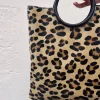 Bolso animal print asa redonda