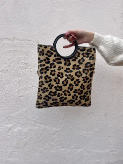Bolso animal print asa redonda