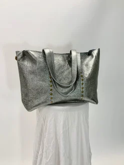 Bolso tachas metalizado