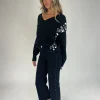 Jeans denim negro tachuelas