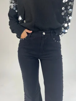 Jeans denim negro tachuelas