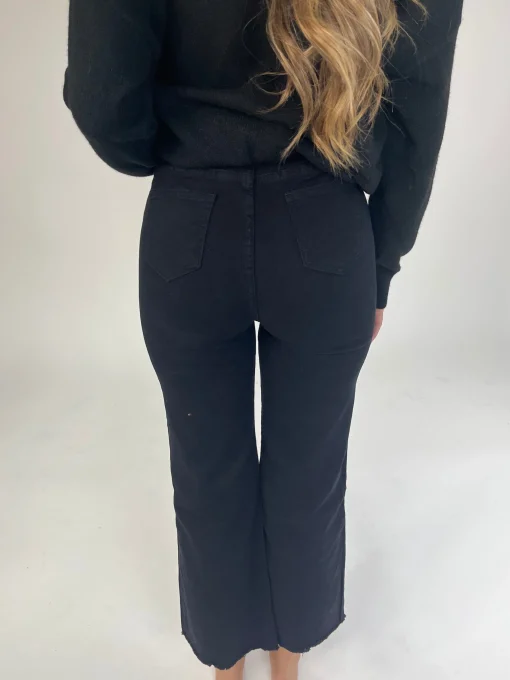 Jeans denim negro tachuelas